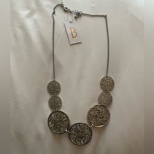 Silver necklace circular design
